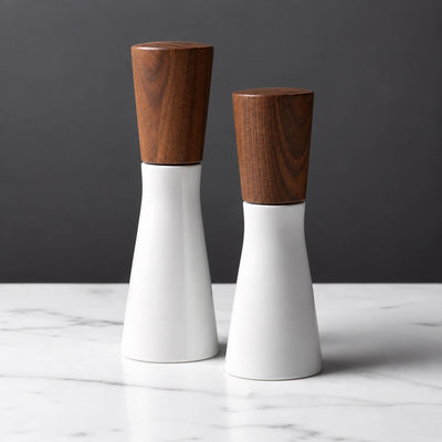 Magnus Lundstrom Porcelain and Dark Walnut Pepper Mill, Side by Side, Large and Medium, designed and finished in New York.